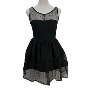 Black sleeveless polka dot tulle dress